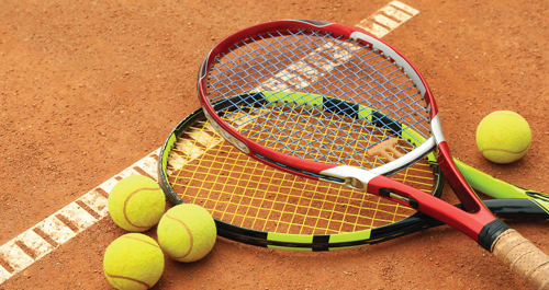 Tennis player in action during training